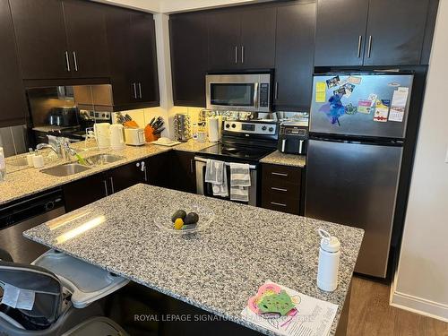 1201-50 Absolute Ave, Mississauga, ON - Indoor Photo Showing Kitchen With Double Sink With Upgraded Kitchen