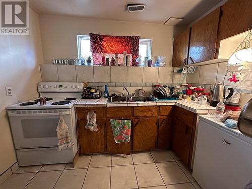2220-2226 Upland Street, Prince George, BC - Indoor Photo Showing Kitchen With Double Sink