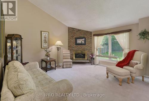 4095 Barbican Drive, Mississauga, ON - Indoor Photo Showing Living Room With Fireplace