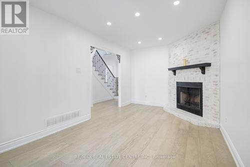 6413 Warbler Lane, Mississauga, ON - Indoor Photo Showing Other Room With Fireplace