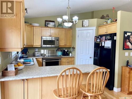 352 Bendel Crescent, Martensville, SK - Indoor Photo Showing Kitchen With Double Sink