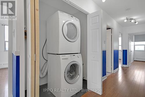 1004 - 551 The West Mall, Toronto, ON - Indoor Photo Showing Laundry Room