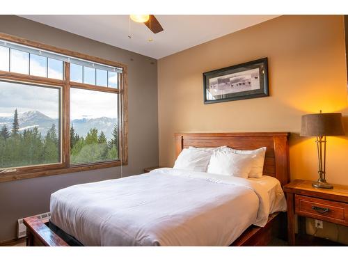 303 - 1549 Kicking Horse Trail, Golden, BC - Indoor Photo Showing Bedroom