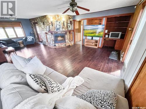 Bregenser Acreage, Swift Current Rm No. 137, SK - Indoor Photo Showing Living Room With Fireplace