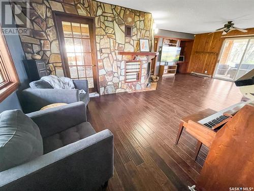 Bregenser Acreage, Swift Current Rm No. 137, SK - Indoor Photo Showing Living Room With Fireplace