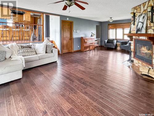 Bregenser Acreage, Swift Current Rm No. 137, SK - Indoor Photo Showing Living Room With Fireplace