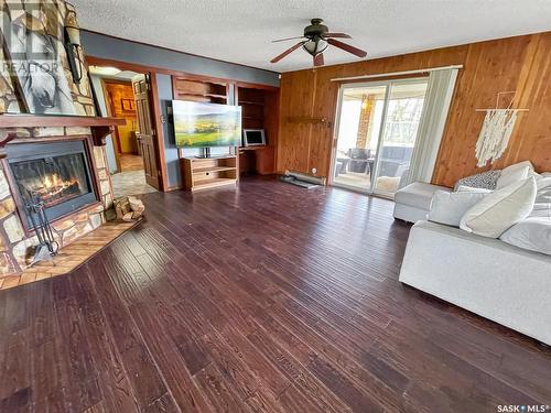 Bregenser Acreage, Swift Current Rm No. 137, SK - Indoor Photo Showing Living Room With Fireplace