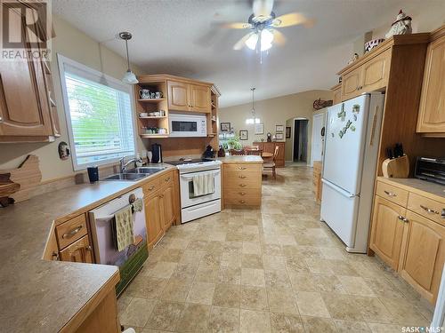 225 3Rd Street, North Weyburn, SK - Indoor Photo Showing Kitchen With Double Sink