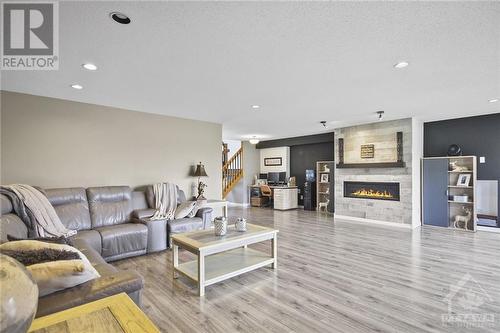 1700 Lakeshore Drive, Greely, ON - Indoor Photo Showing Living Room With Fireplace