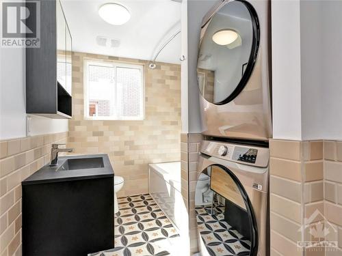Bathroom and laundry - 1436 Bellamy Street, Ottawa, ON - Indoor Photo Showing Laundry Room