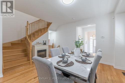 36 Northhill Avenue, Cavan Monaghan, ON - Indoor Photo Showing Dining Room With Fireplace