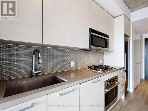 406 - 60 Haslett Avenue, Toronto, ON - Indoor Photo Showing Kitchen With Upgraded Kitchen