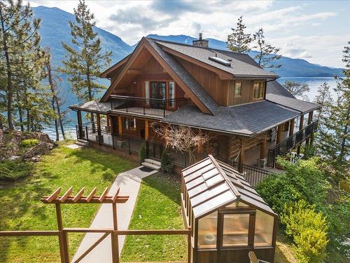 4704 Twin Bays Rd, Fletcher Creek, BC - Outdoor With Body Of Water With Deck Patio Veranda