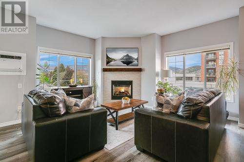 1125 Bernard Avenue Unit# 306, Kelowna, BC - Indoor Photo Showing Living Room With Fireplace