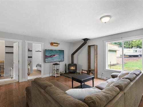 1920 Pierce Way, Qualicum Beach, BC - Indoor Photo Showing Living Room With Fireplace