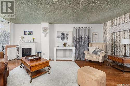 443 Athabasca Street W, Moose Jaw, SK - Indoor Photo Showing Living Room With Fireplace