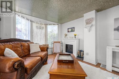 443 Athabasca Street W, Moose Jaw, SK - Indoor Photo Showing Living Room With Fireplace