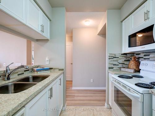 1018-1200 The Esplanade  N, Pickering, ON - Indoor Photo Showing Kitchen With Double Sink