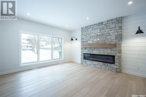 1308 14Th Street E, Saskatoon, SK - Indoor Photo Showing Living Room With Fireplace