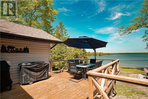 105 Big Lake Dam Road, Mindemoya, Manitoulin Island, ON - Outdoor With Body Of Water With Deck Patio Veranda With Exterior