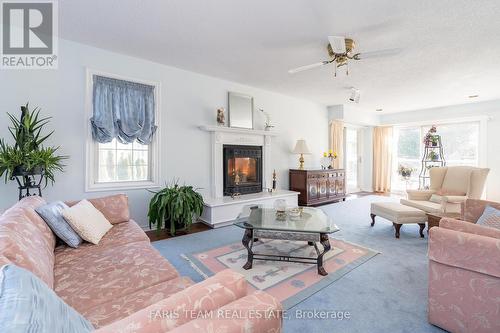 98 Turtle Path, Ramara (Brechin), ON - Indoor Photo Showing Living Room With Fireplace