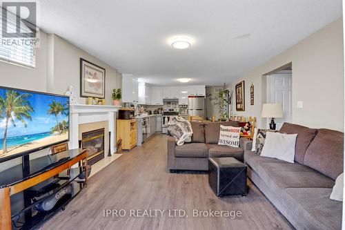 23 Garibaldi Drive, Barrie, ON - Indoor Photo Showing Living Room With Fireplace