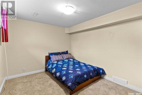 302 Wright Court, Saskatoon, SK - Indoor Photo Showing Bedroom