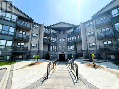 309 - 1 Jacksway Crescent, London, ON - Outdoor With Balcony With Facade