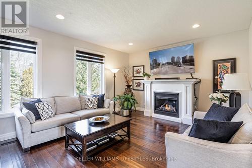 23 Earlscourt Terrace, Middlesex Centre, ON - Indoor Photo Showing Living Room With Fireplace