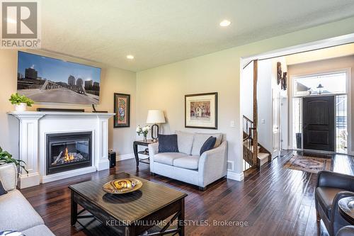 23 Earlscourt Terrace, Middlesex Centre, ON - Indoor Photo Showing Living Room With Fireplace