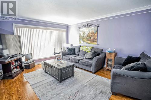 62 Chalkfarm Drive, Toronto, ON - Indoor Photo Showing Living Room
