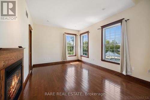 229 Hedge Road, Georgina, ON - Indoor Photo Showing Other Room With Fireplace