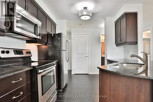 311 - 7730 Kipling Avenue, Vaughan, ON - Indoor Photo Showing Kitchen With Stainless Steel Kitchen With Double Sink