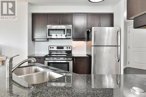 311 - 7730 Kipling Avenue, Vaughan, ON - Indoor Photo Showing Kitchen With Stainless Steel Kitchen With Double Sink With Upgraded Kitchen