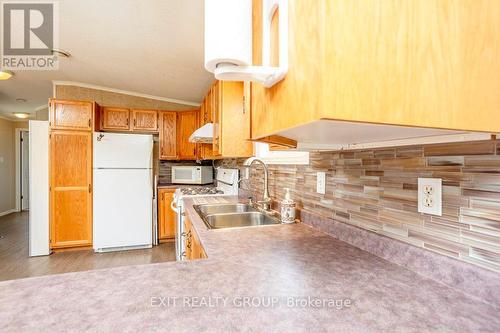 #30-152 Concession Road 11 W, Trent Hills (Hastings), ON - Indoor Photo Showing Kitchen With Double Sink