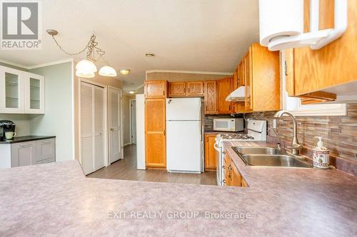 #30-152 Concession Road 11 W, Trent Hills (Hastings), ON - Indoor Photo Showing Kitchen With Double Sink