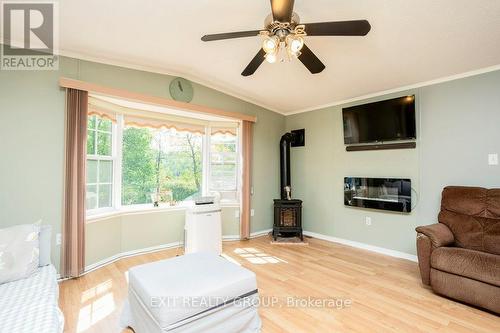 #30-152 Concession Road 11 W, Trent Hills (Hastings), ON - Indoor Photo Showing Living Room With Fireplace