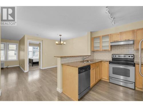 551 Yates Road Unit# 302, Kelowna, BC - Indoor Photo Showing Kitchen With Double Sink