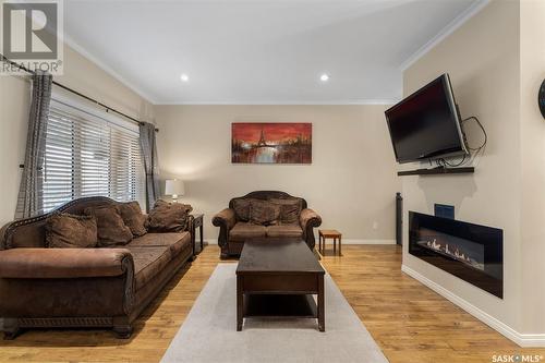327 Arscott Crescent, Saskatoon, SK - Indoor Photo Showing Living Room With Fireplace
