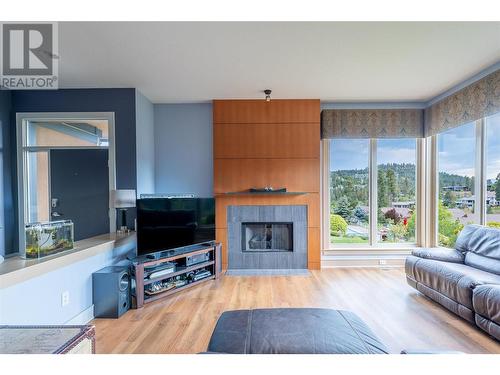 101 Falcon Point Way Unit# 3, Vernon, BC - Indoor Photo Showing Living Room With Fireplace