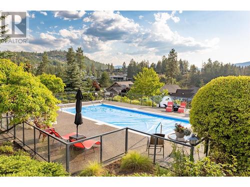 101 Falcon Point Way Unit# 3, Vernon, BC - Outdoor With In Ground Pool With View