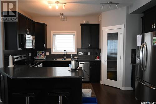 4173 Green Olive Way E, Regina, SK - Indoor Photo Showing Kitchen With Stainless Steel Kitchen With Double Sink