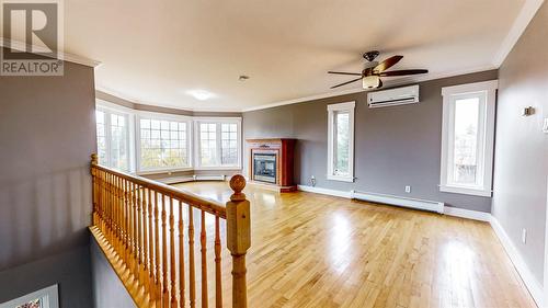 1 Kelly'S Lane, Torbay, NL - Indoor Photo Showing Other Room With Fireplace