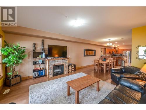 5401 Lakeshore Drive Unit# 104, Osoyoos, BC - Indoor Photo Showing Living Room With Fireplace