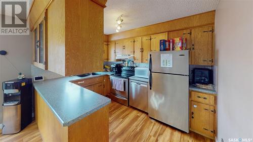 187 Merlin Crescent, Regina, SK - Indoor Photo Showing Kitchen With Double Sink