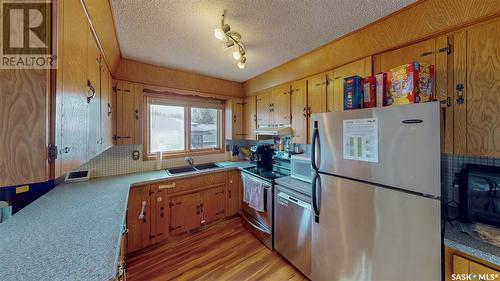 187 Merlin Crescent, Regina, SK - Indoor Photo Showing Kitchen With Double Sink
