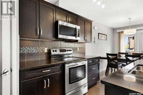 4546 Green Poplar Lane, Regina, SK - Indoor Photo Showing Kitchen With Double Sink
