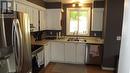 28 Axmith Ave, Elliot Lake, ON  - Indoor Photo Showing Kitchen With Double Sink 