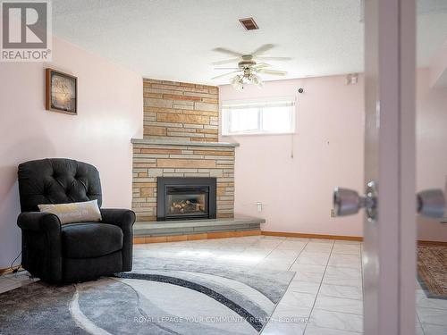 52 Magellan Drive, Toronto, ON - Indoor Photo Showing Living Room With Fireplace