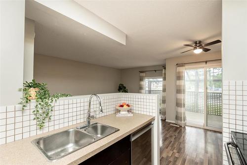 6 210 Goulet Street, Winnipeg, MB - Indoor Photo Showing Kitchen With Double Sink